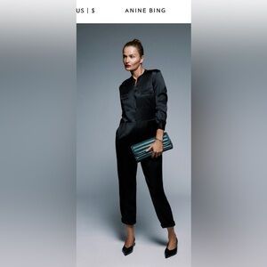 Anine Bing Black Jumpsuit with Green Clutch